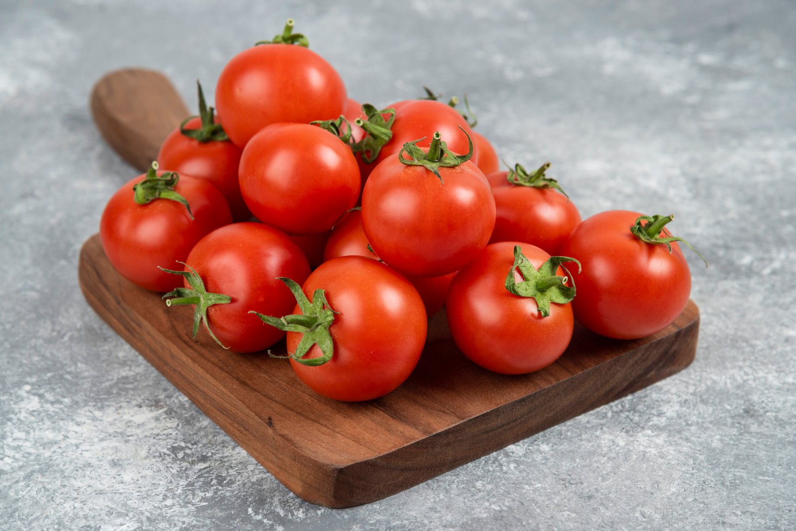 bunch-red-fresh-tomatoes-wooden-cutting-board-scaled.jpg
